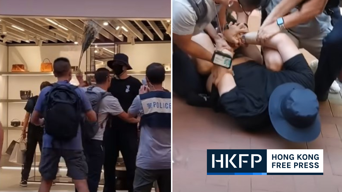 Man with white flowers arrested in Hong Kong on China’s National Day holiday